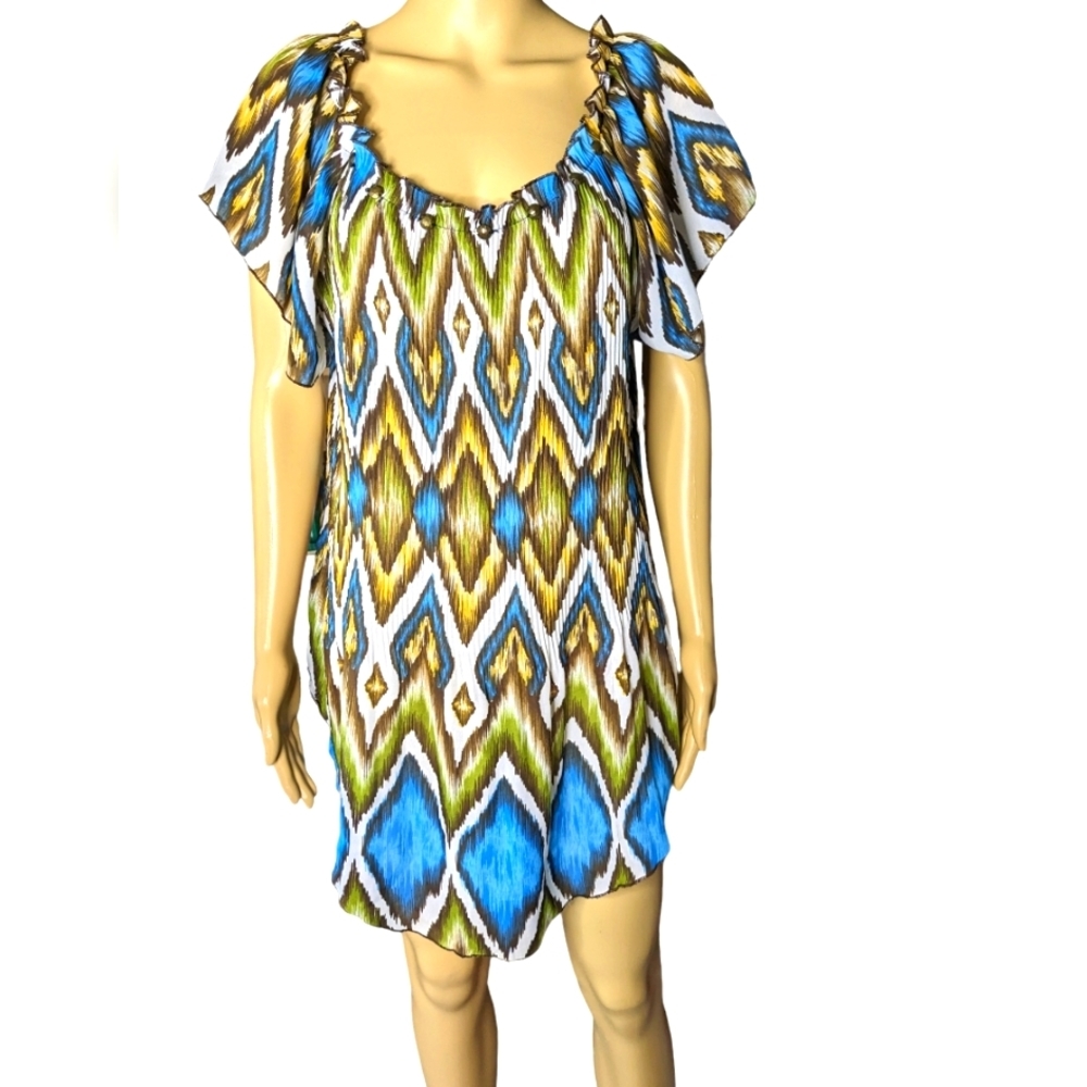 Boho bright & bold stretchy dress w/embellishments on ruffled neckline.